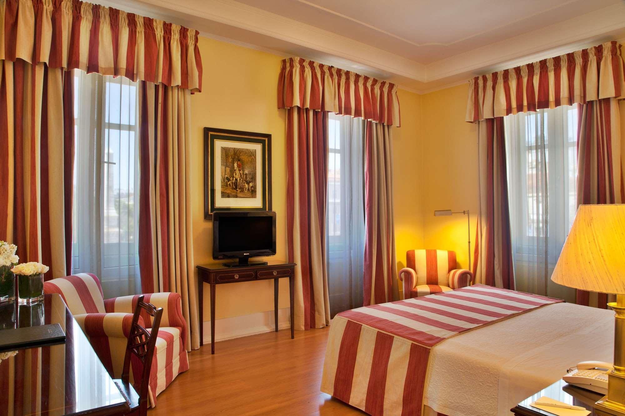 Hotel Avenida Palace Lisabona Exterior foto A room at the hotel