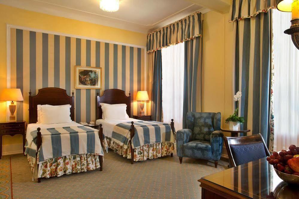Hotel Avenida Palace Lisabona Exterior foto A room at the hotel