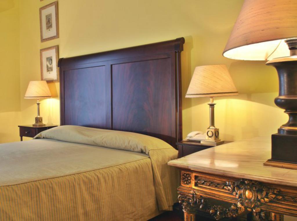 Hotel Avenida Palace Lisabona Cameră foto A bedroom at the hotel